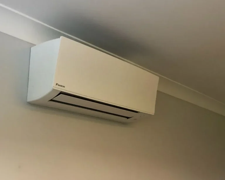 Daikin wall-mounted air conditioning unit in a living room