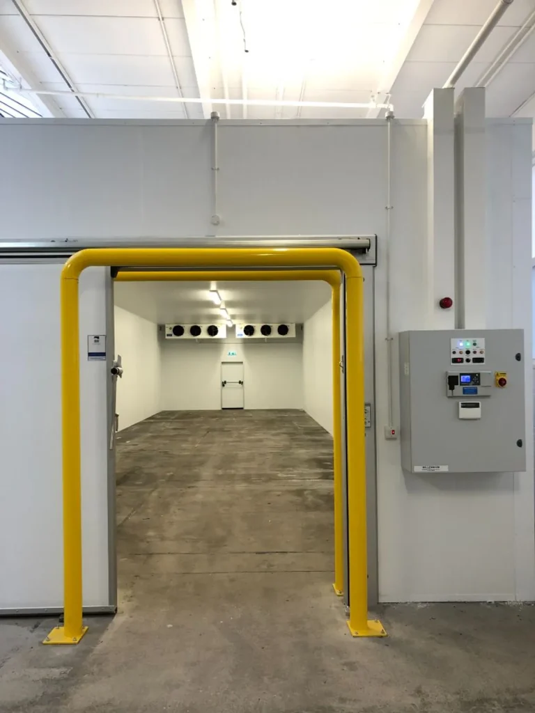 Entrance to the pharmaceutical cold store Millennium built, with protective door frame and control panel